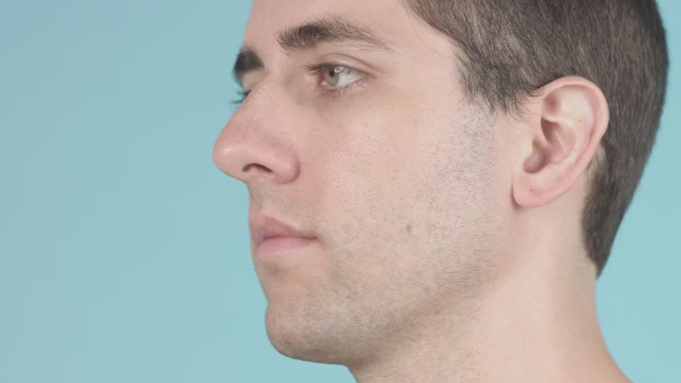 Person inserting and wearing the NasalAid dilator